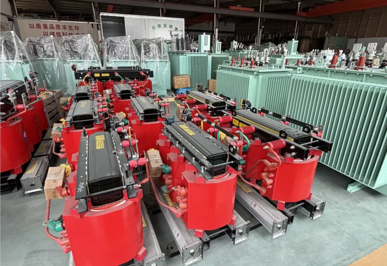 A large batch of red cast resin units on the assembly line of a leading dry type transformer manufacturer, with green oil-immersed units in the background at the Baitong Electric factory.