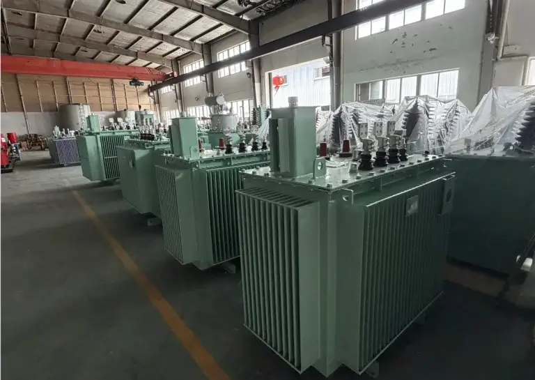 A large batch of green 300kva transformer oil filled units lined up on the Baitong Electric factory floor, ready for strict testing and global export.