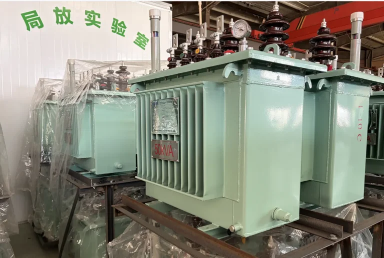Multiple 50 kva oil filled transformer units sitting on metal storage racks outside the partial discharge testing laboratory at Baitong Electric.